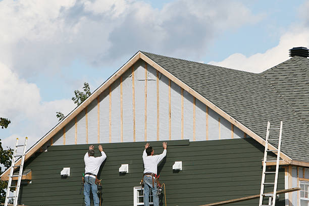 Professional Storm Damage Siding Repair technician working in New Florence, PA